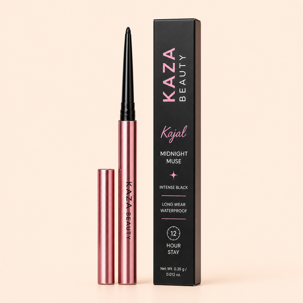 Kaza Beauty Kajal Midnight Mousse eyeliner shown with its black packaging box and two rose gold applicator tubes on a solid pale peach background.